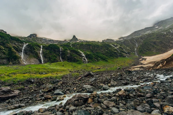 Mountain landscape, waterfalls. Valley of river Achapara, Abkhaz