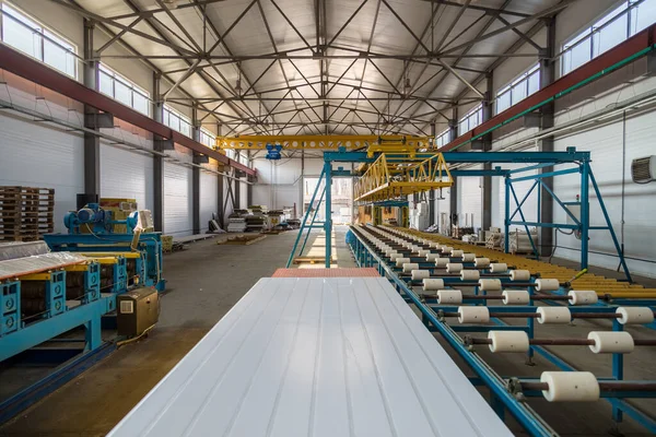 Thermal insulation sandwich panel production line. Machine tools