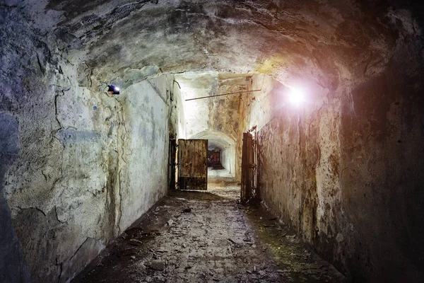 Dark and creepy corridor of old abandoned forgotten Soviet under