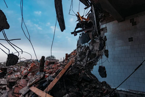 Ruins of old demolished industrial building. Disaster or war consequences concept.