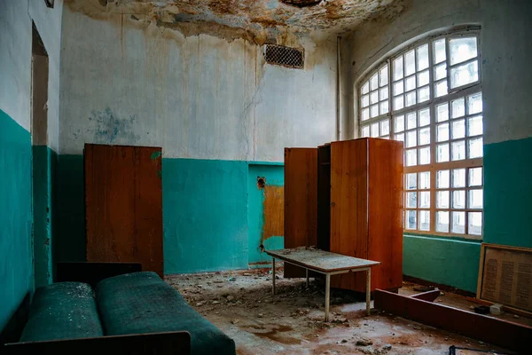 Inside old Orlovka Asylum for the insane in Voronezh Region. Dark creepy abandoned mental hospital.