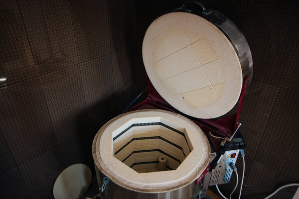 Muffle furnace for firing ceramics in pottery workshop.