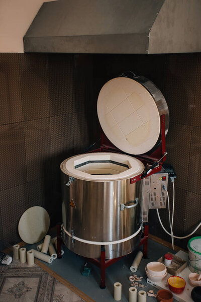 Muffle furnace for firing ceramics in pottery workshop.