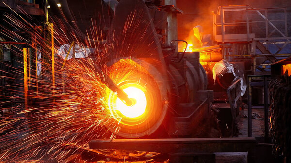 Iron pipe centrifugal pipe casting machine at the foundry.