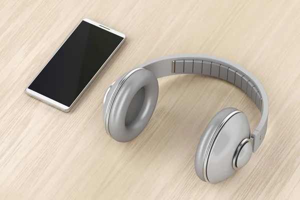 Große Drahtlose Kopfhörer Und Smartphone Auf Holztisch — Stockfoto