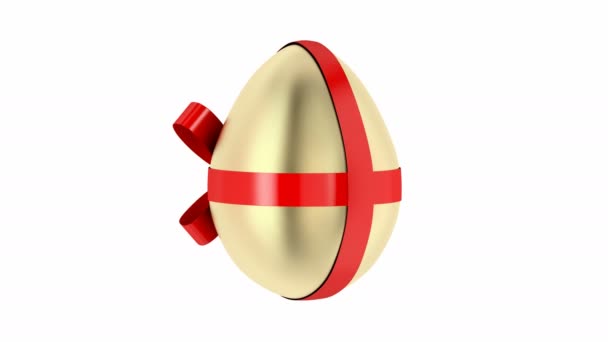 白の背景に赤いリボンのスピンと金の卵 イースターの装飾 — ストック動画