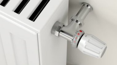Isıtma radyatörü üzerinde termostatik vana tornalama ile odadaki sıcaklığın düzenlenmesi