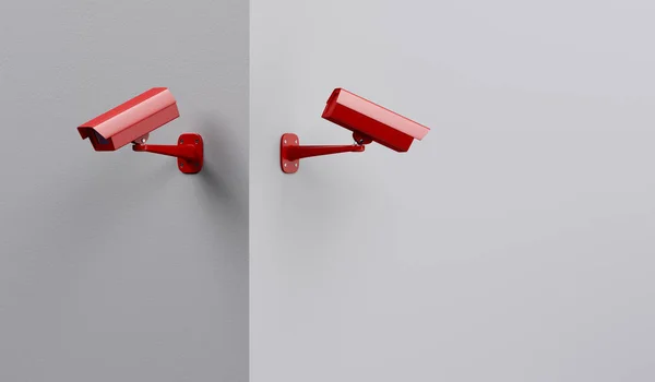 Zwei rote Überwachungskameras — Stockfoto
