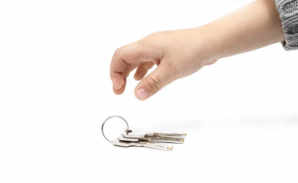 Mano Niño Llaves Sobre Fondo Blanco — Foto de Stock