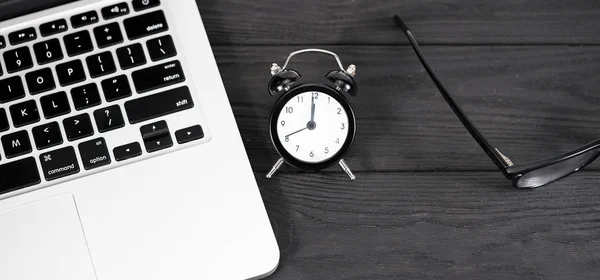 Computer Alarm Clock Glasses Wooden Background — Stock Photo, Image