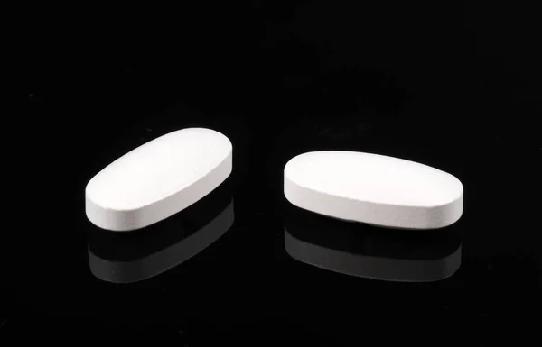 Tabletki Czarnym Tle — Zdjęcie stockowe
