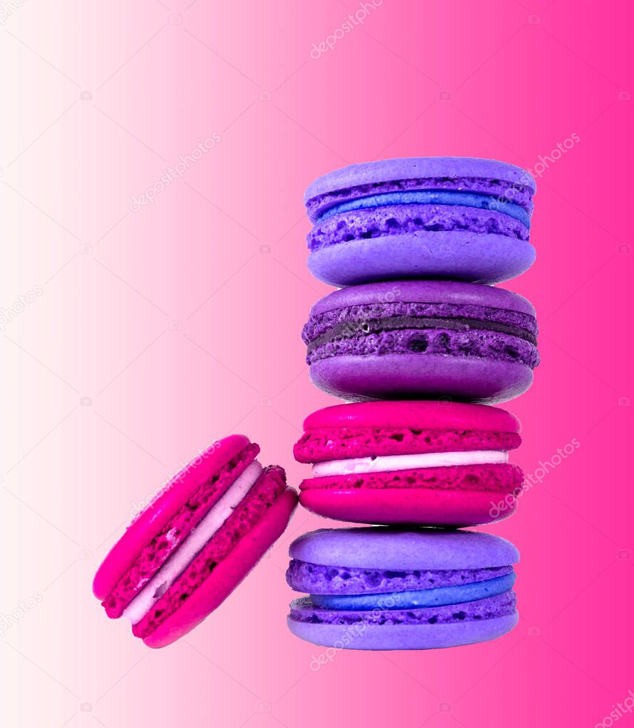 Close-Up Of Macaroons Against pink Background