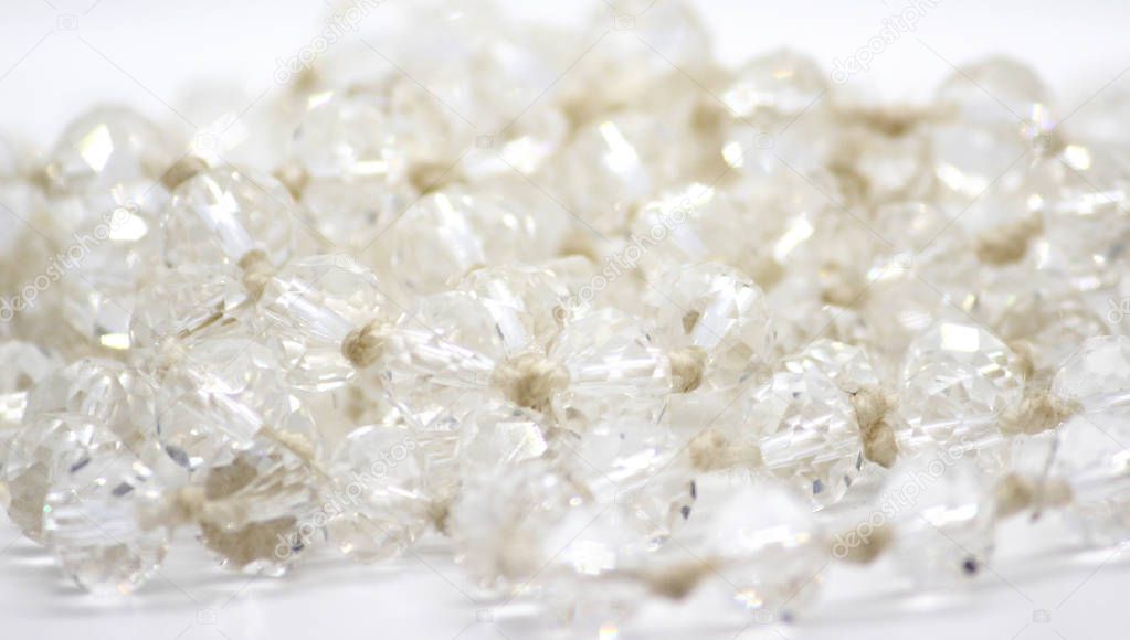 White Sparkling beads on the white