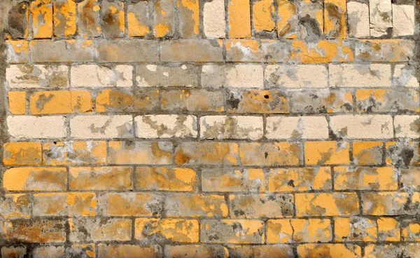 yellow or light brick wall
