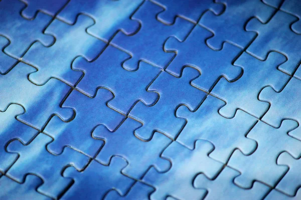 Leeres Puzzle mit blauer Tönung lizenzfreie Stockbilder