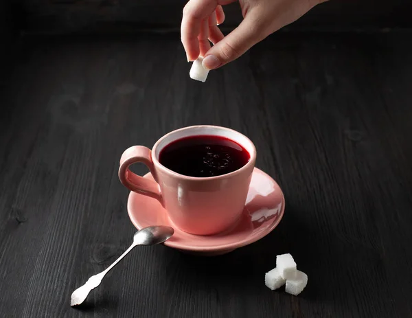 Cup of tea and sugar cubes — Stock Photo, Image