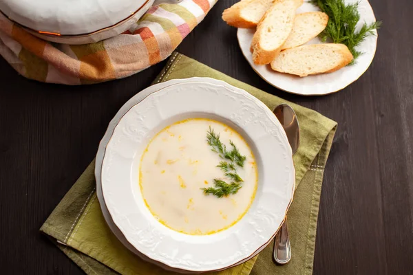 Creamy fish soup with salmon, potatoes, onions and carrots — Stock Image Creamy fish soup with salmon, potatoes, onions and carrots Stock Picture