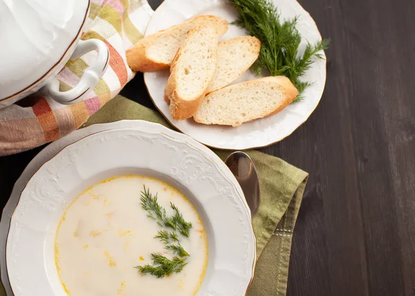 Creamy fish soup with salmon, potatoes, onions and carrots — Stock Image Creamy fish soup with salmon, potatoes, onions and carrots Royalty Free Stock Photos