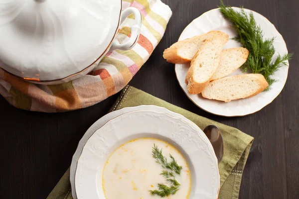 Creamy fish soup with salmon, potatoes, onions and carrots — Stock Image Creamy fish soup with salmon, potatoes, onions and carrots Stock Photo