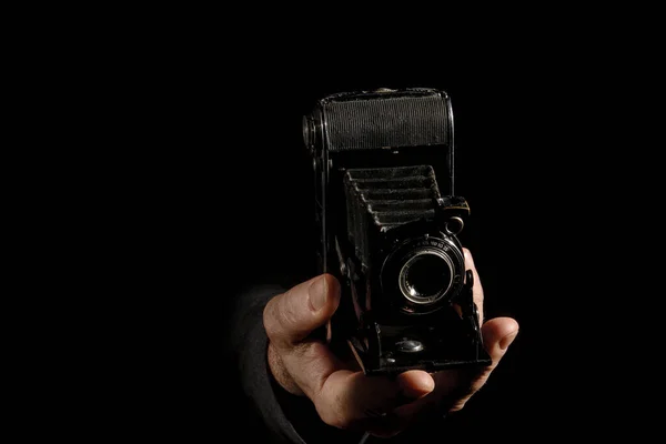 Vintage Bellows Camera Hand Photographer Black Background — Stock Photo, Image