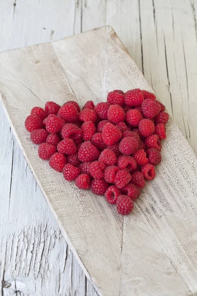 Red Sweet Raspberry Heart On Wood — Stock Photo, Image