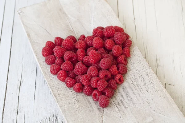 Red Sweet Raspberry Heart On Wood — Stock Photo, Image