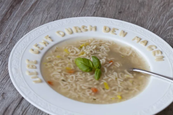 Alphabet Soup With Funny Text In German — Stock Photo, Image