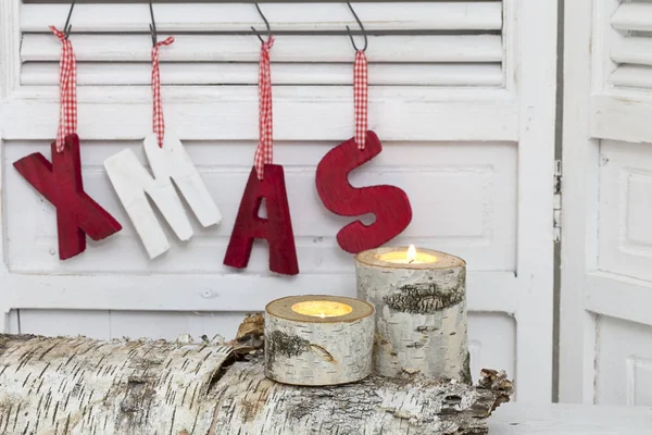 Rustikální vánoční dekorace se slovem Vánoce — Stock fotografie