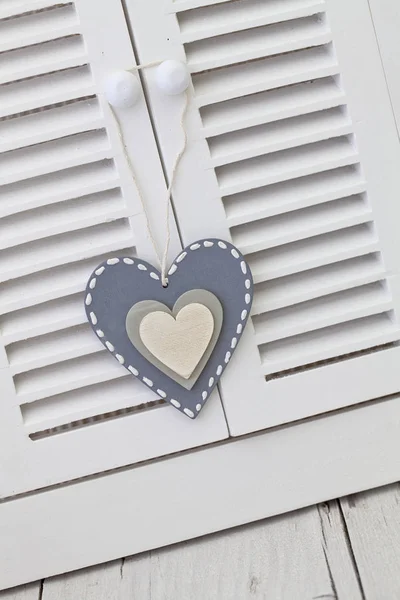 Grey Wood Heart Hanging On Shutter — 스톡 사진