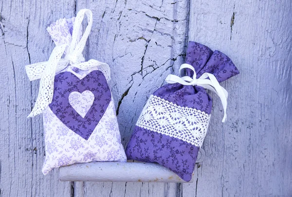 Pretty hand-sewn fabric bags with lavender flowers — Stock Photo, Image