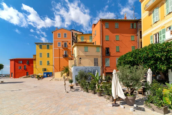 Small town square and colorful houses in Menton. — Stock Photo, Image