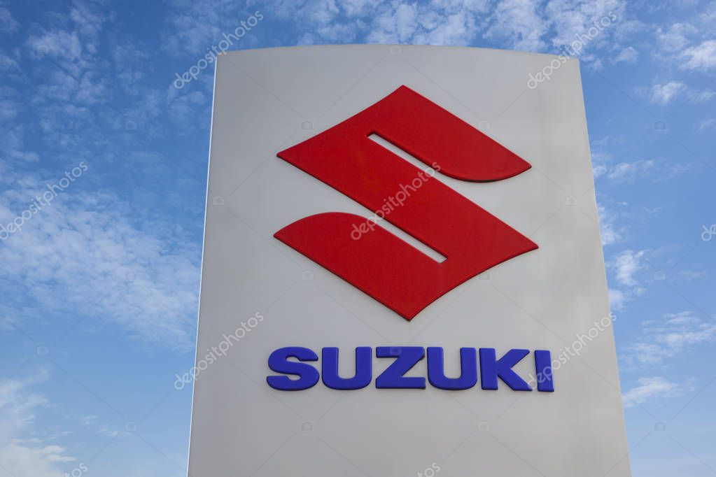 WETZLAR - MARCH 25 2018: Suzuki Motor Corporation logo. Suzuki Motor Corporation is a Japanese multinational corporation,that manufactures automobiles, four-wheel drive vehicles, motorcycles.
