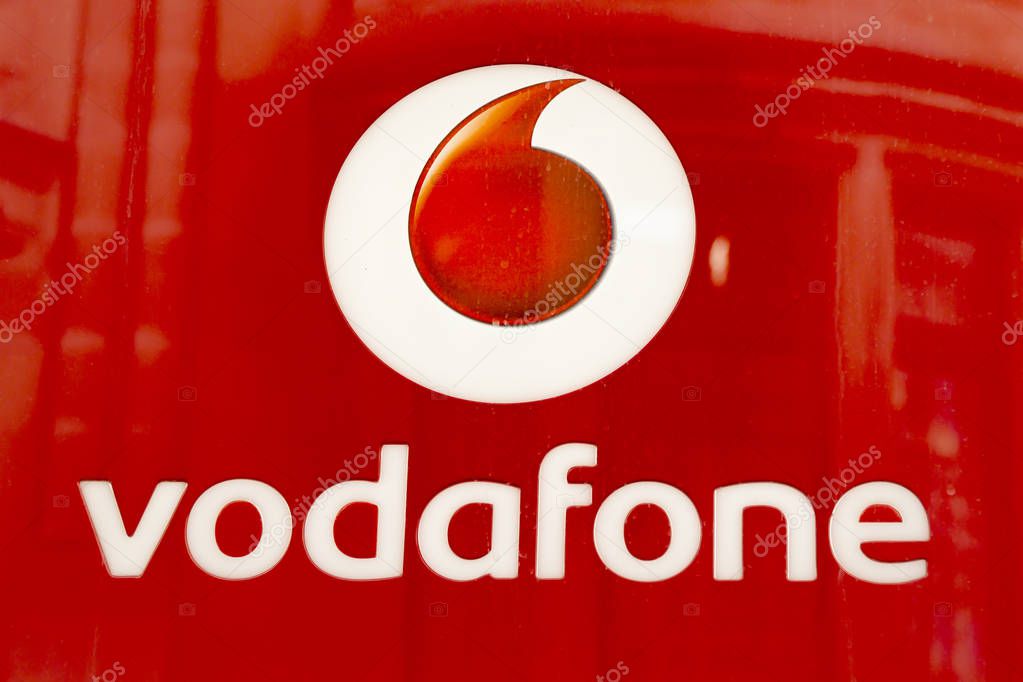Wiesbaden, Germany - June 03 2018: Vodafone logo on a facade. Vodafone is a British multinational telecommunications company and the world's 2nd-largest mobile telecommunications provider.