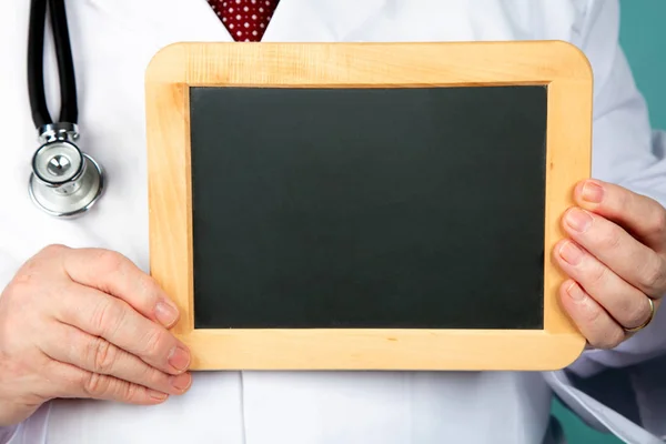 Doctor Holding Blank Chalkboard Detail — Stock Photo, Image