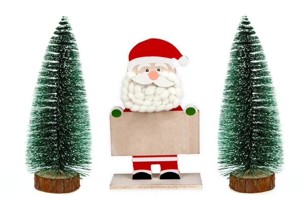 Διακοσμητικά Ξύλινα Santa Clause Παρατεταμένα Έναν Κενό Πίνακα Παιχνίδι Δέντρα — Φωτογραφία Αρχείου