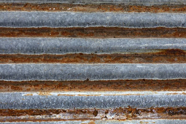 Σκουριασμένος Παλαιός Κυματοειδής Σίδηρος Φύλλων Στη Λεπτομέρεια — Φωτογραφία Αρχείου