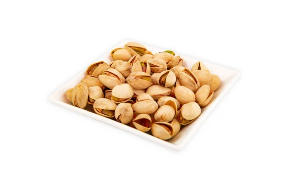 Saboroso Pistachio Nuts Uma Tigela Isolada Fundo Branco — Fotografia de Stock