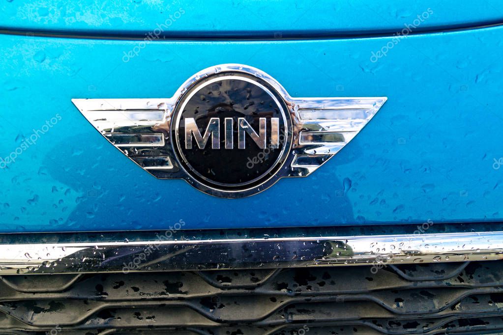 GIESSEN, Germany - JULY 19, 2018: Mini Cooper logo. Introduced in 1969, it is a British automotive marque owned by BMW which specialises in small cars