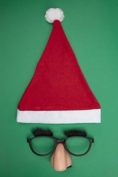 Santa Clause cap with funny mask — Stock Photo, Image