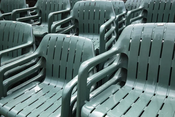 Green plastic chairs — Stock Photo, Image