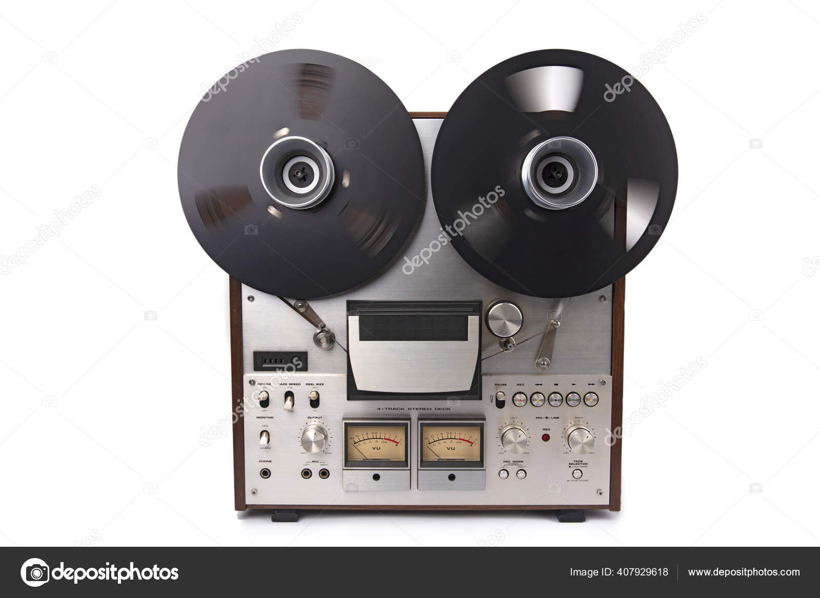 https://st4.depositphotos.com/1002997/40792/i/1600/depositphotos_407929618-stock-photo-reel-reel-audio-tape-recorder.jpg