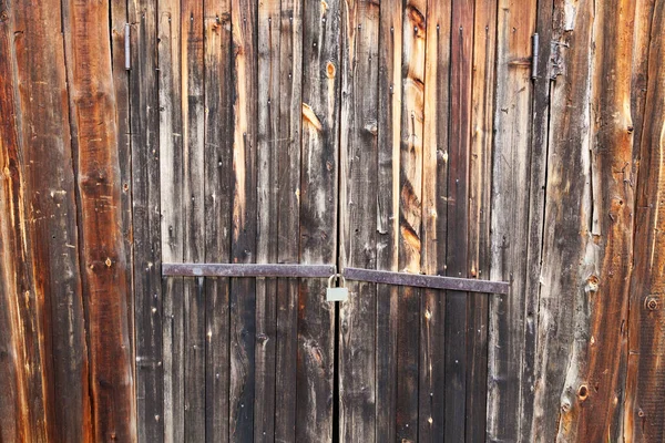 Burnt Wooden Door Locked Rusty Padlock — Stock Photo, Image