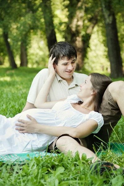 Pregnant Wife Her Loved Husband Lying Green Grass — Stock Photo, Image