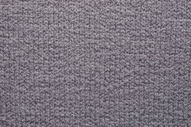 Dikensiz gri örgü kumaş dokusuna yakın çekim