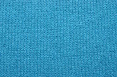 Dikensiz mavi örgü kumaş dokusuna yakın çekim