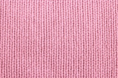 Pembe örülmüş kumaş dokusuna yakın çekim
