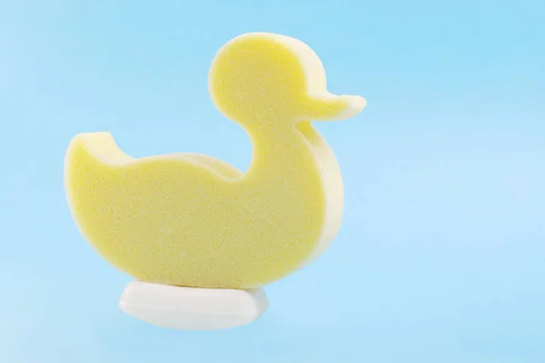 Yellow Duck Sponge Piece Soap Light Blue Background — Stock Photo, Image