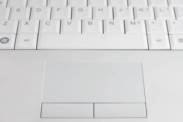 Closeup White Laptop Keyboard Touchpad Selective Focus Royalty Free Stock Photos