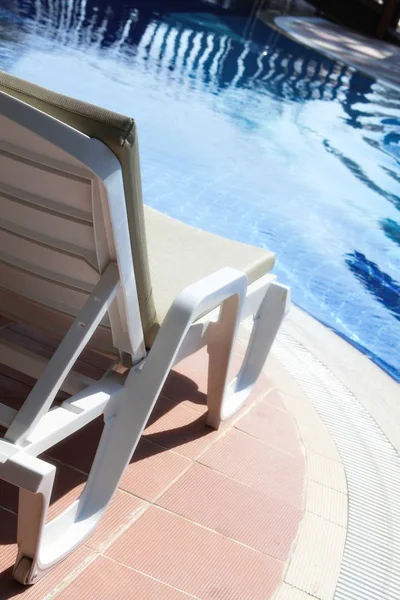 Lounger by the pool — Stock Photo, Image