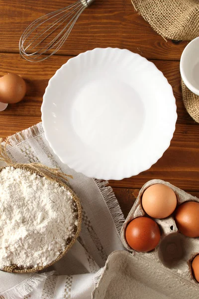 Kitchen table with products — Stock Photo, Image